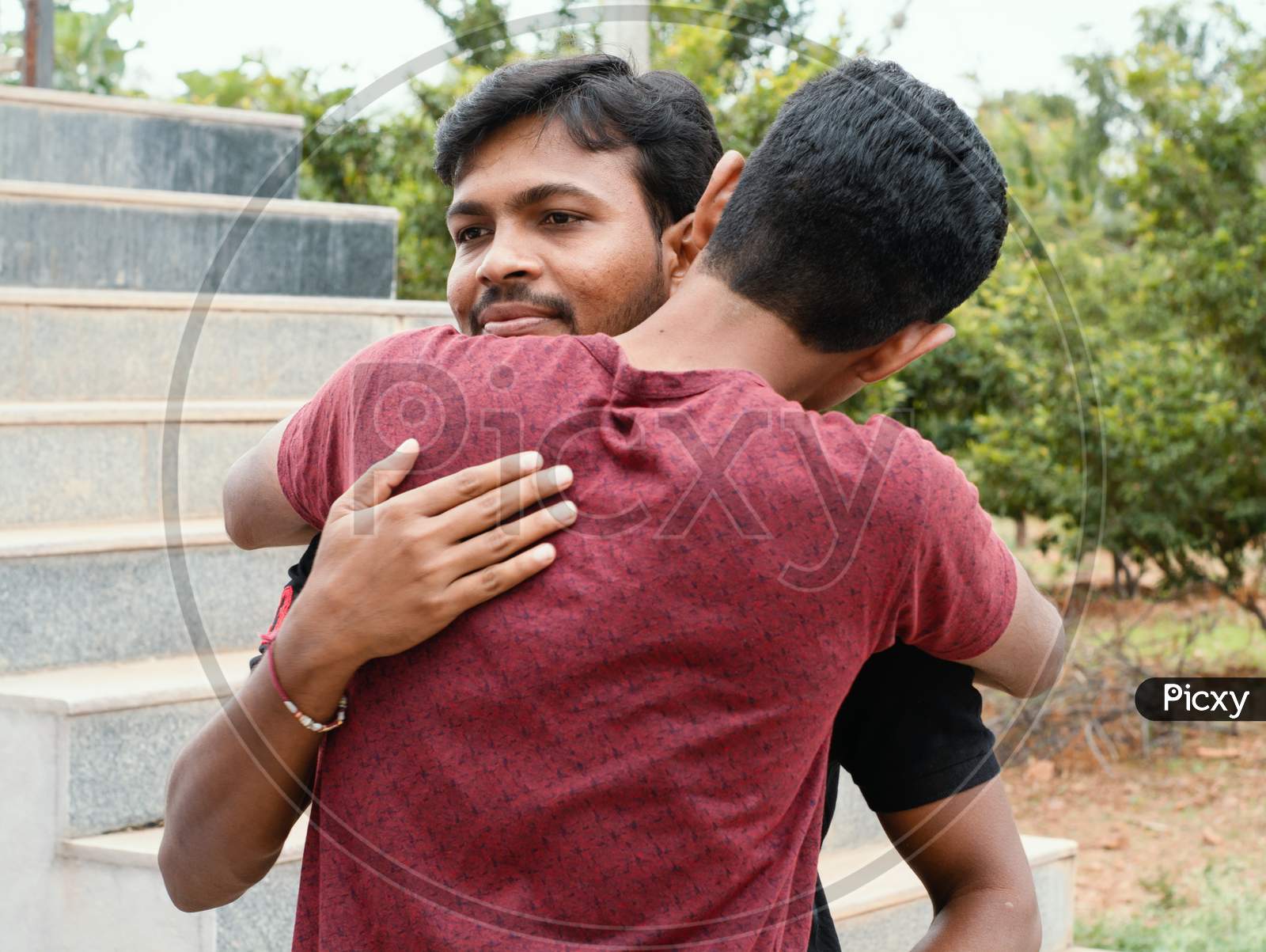 Couple of Young Indian Students Hugging Each other
