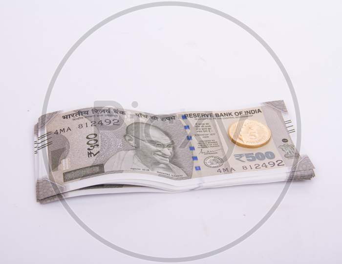 Five Hundred Rupees With New Indian Five Rupee Coin
