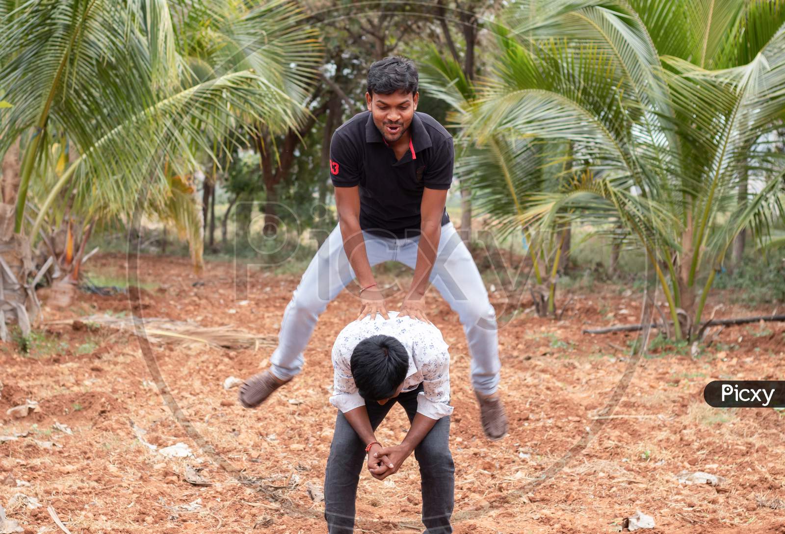 Young Indian people playing Outdoor Games
