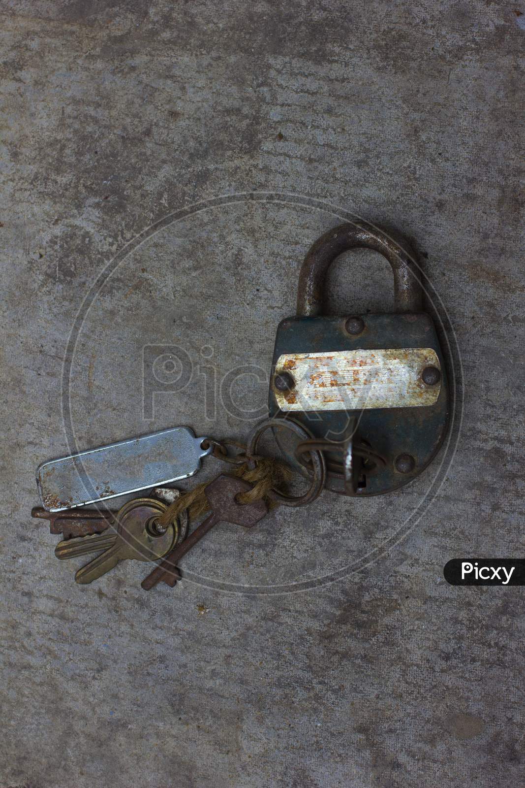 A Rusted Clock with Keys