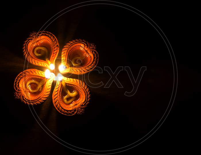 Lightened Diya's A Concept of Happy Diwali Greetings