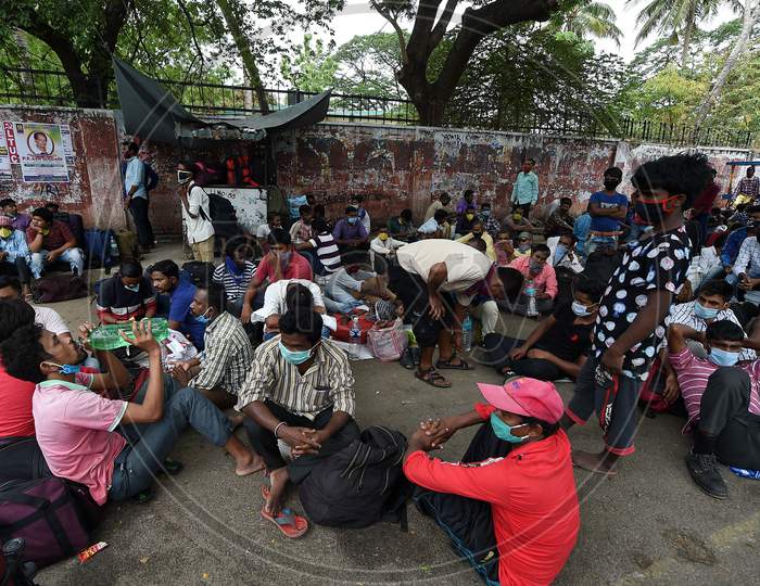 Migrant Workers From Bihar, Wait To Board A Bus To Reach Central Railway Station,Chennai