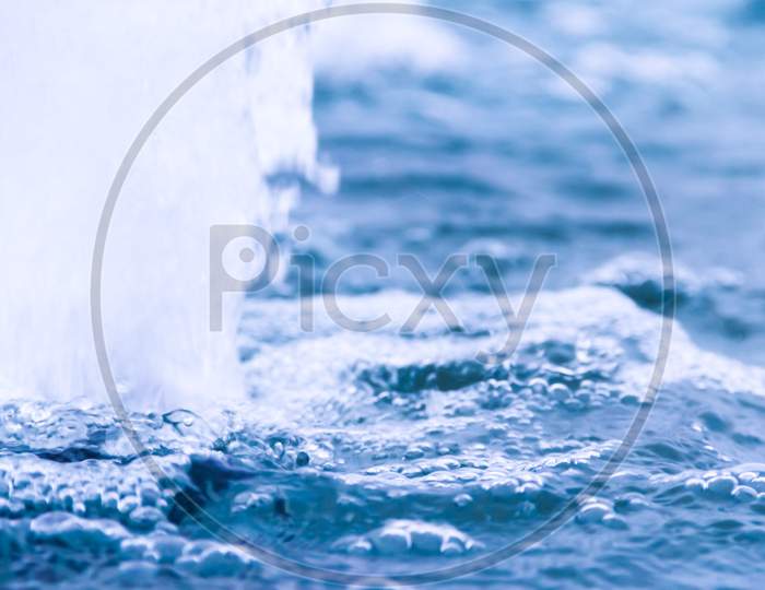 Abstract Background Bubbles Falling Rain On Water
