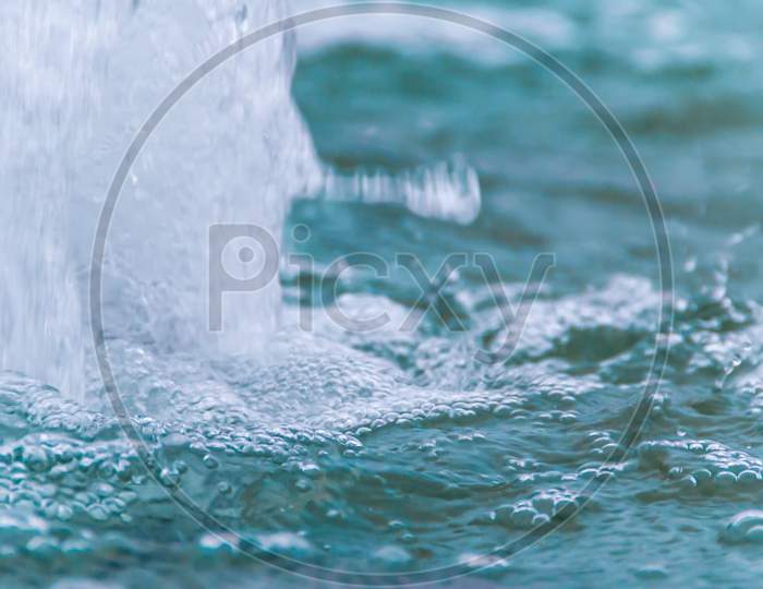 Abstract Background Bubbles Falling Rain On Water