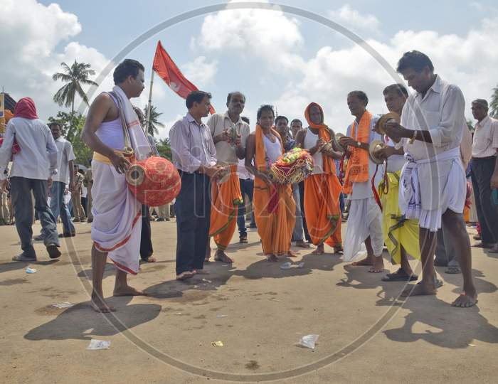 colourful devotees performing during ratha yatra festival at puri odisha india