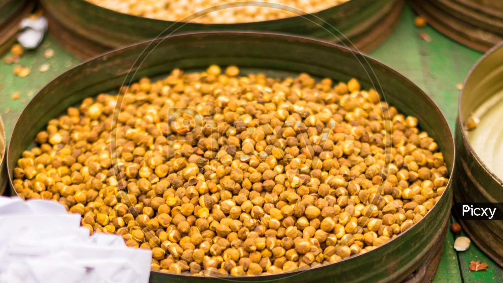 Roasted Chickpeas Displayed On A Green Bowl For Sell In A Road Side Food Van