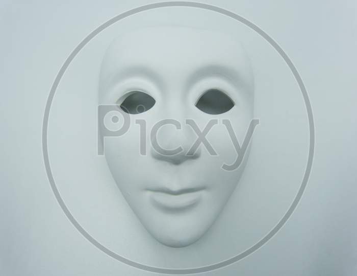 White mask on a white background
