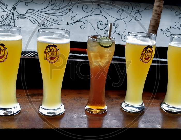 Glasses Of Beer On The Table In Toit Brew Pub Bangalore