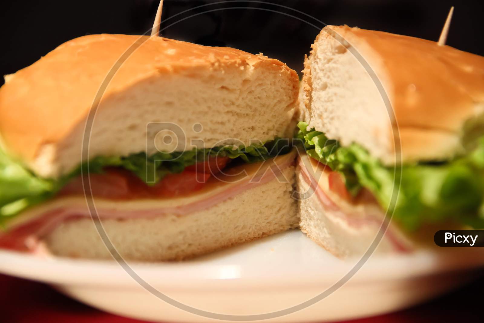 Detail Of Ham Cheese Lettuce And Tomato Sandwich