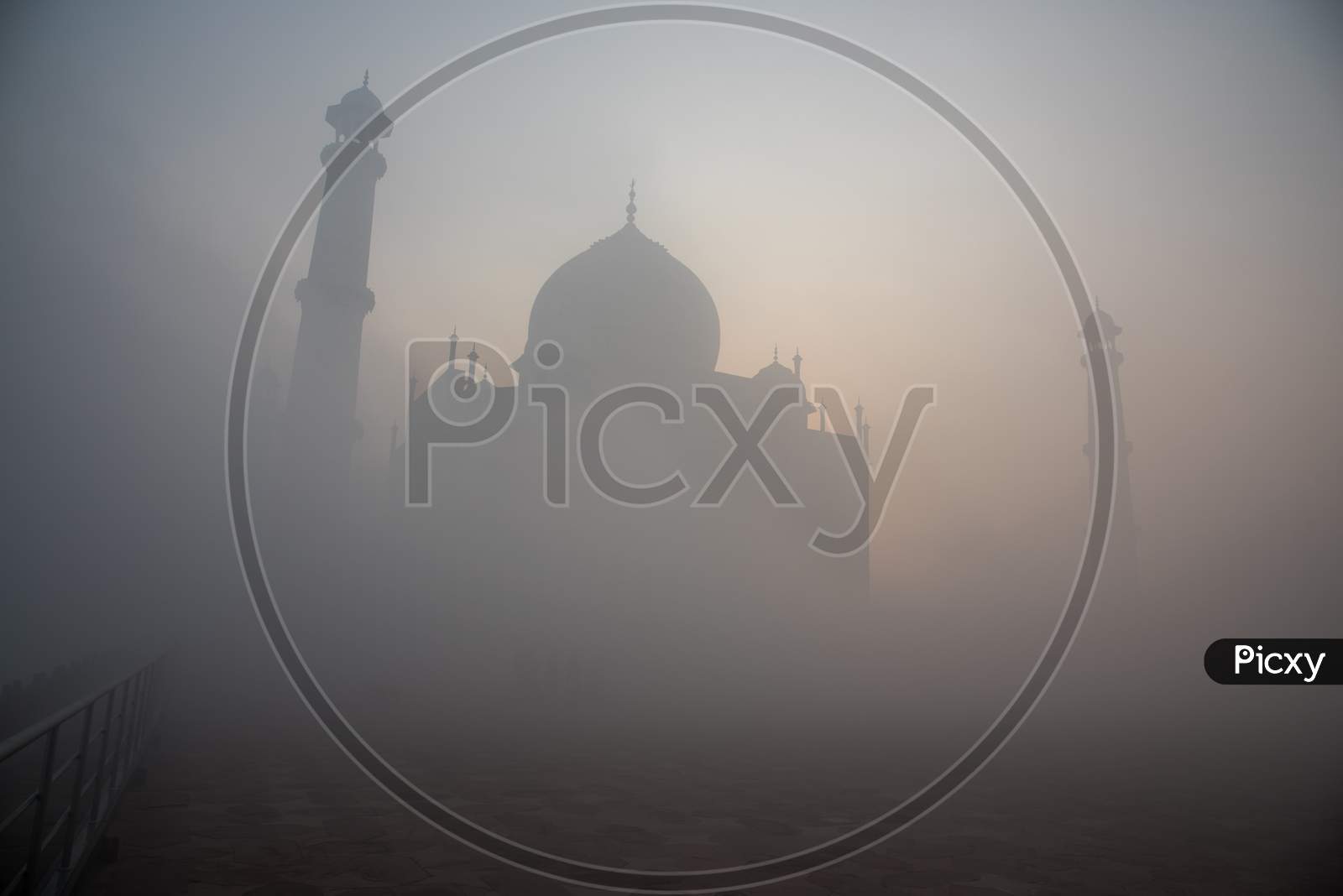 Foggy winter sunrise at the Taj mahal, Agra, Uttar Pradesh, India.