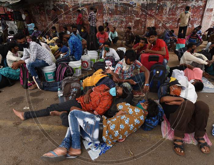 Migrant Workers From Bihar, Wait To Board A Bus To Reach Central Railway Station,Chennai