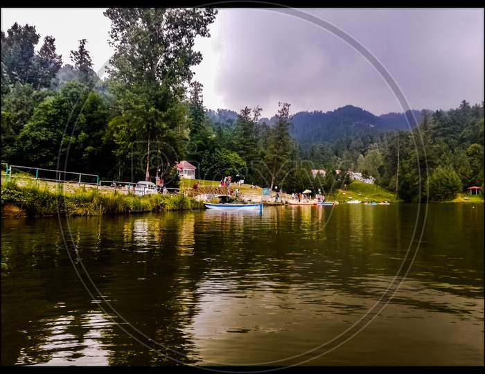 lake  in kashmir and boat