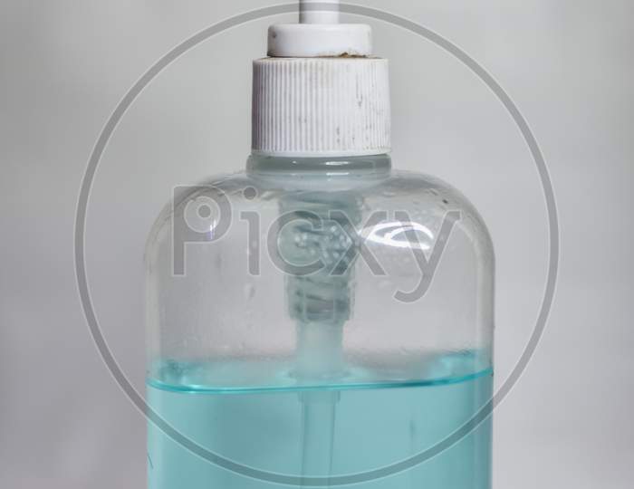 white hand sanitizer bottle on a white blur background, Hand Sanitizer
