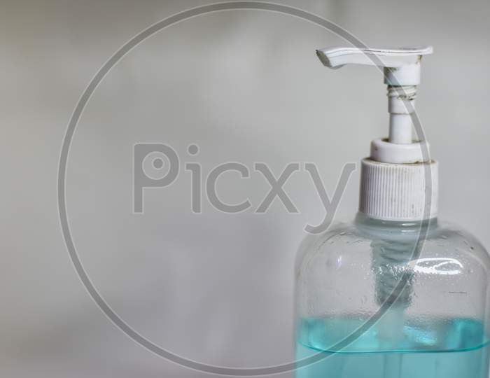 white hand sanitizer bottle on a white blur background, Hand Sanitizer
