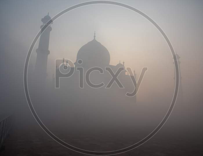 Foggy winter sunrise at the Taj mahal, Agra, Uttar Pradesh, India.