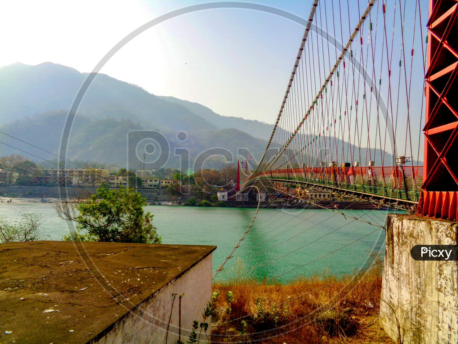 Beautiful Lakshman Jhula Bridge And Ganga River In The Spiritual Town Of Rishikesh, India