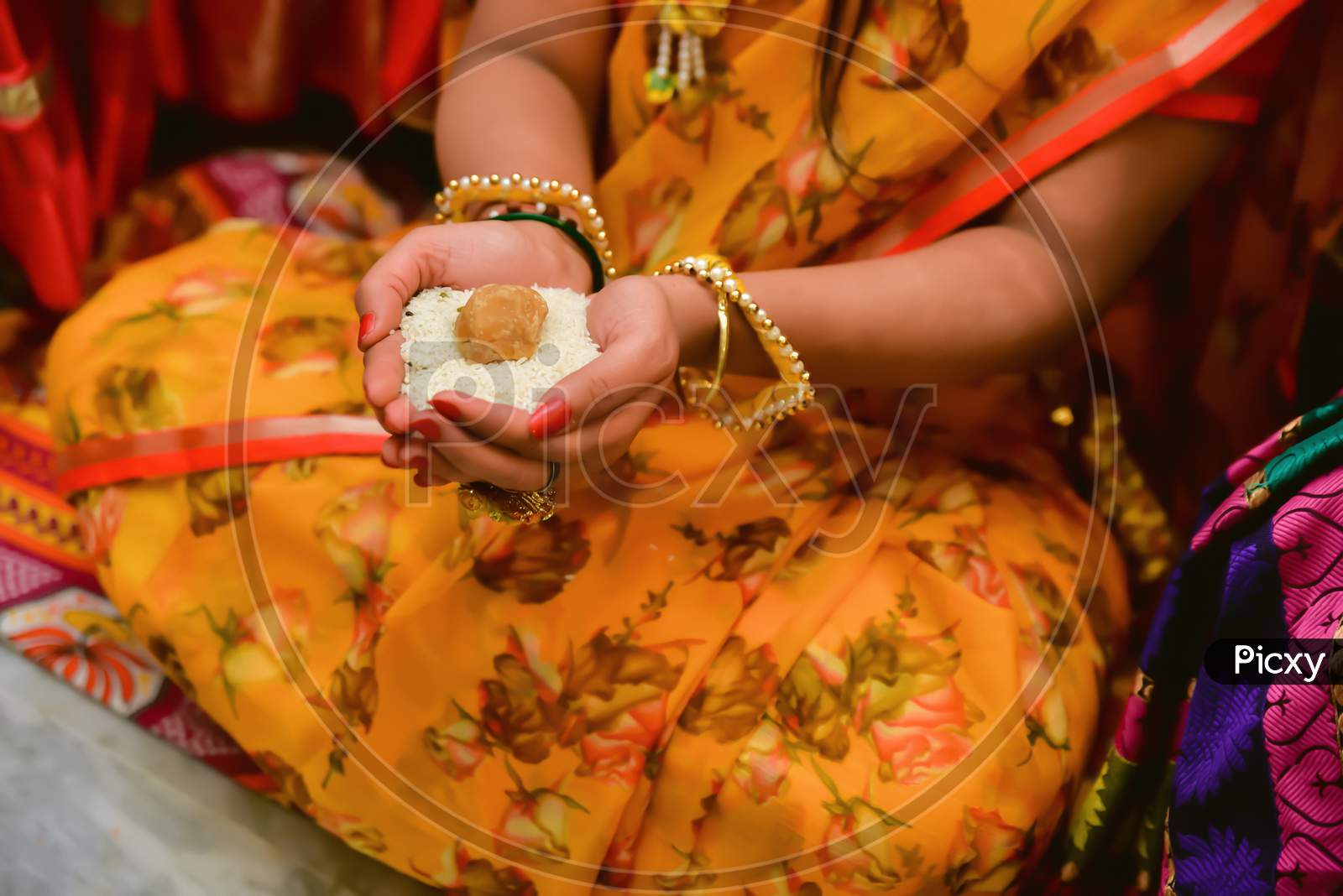 Indians doing puja at a wedding function