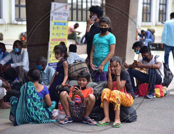 Migrant Workers And Families wait With Their Luggage At the Guwahati Railway Station To Board A Train, After The Government Eased A Nationwide Lockdown Against The Covid-19 Coronavirus, In Guwahati, India On June 14, 2020.