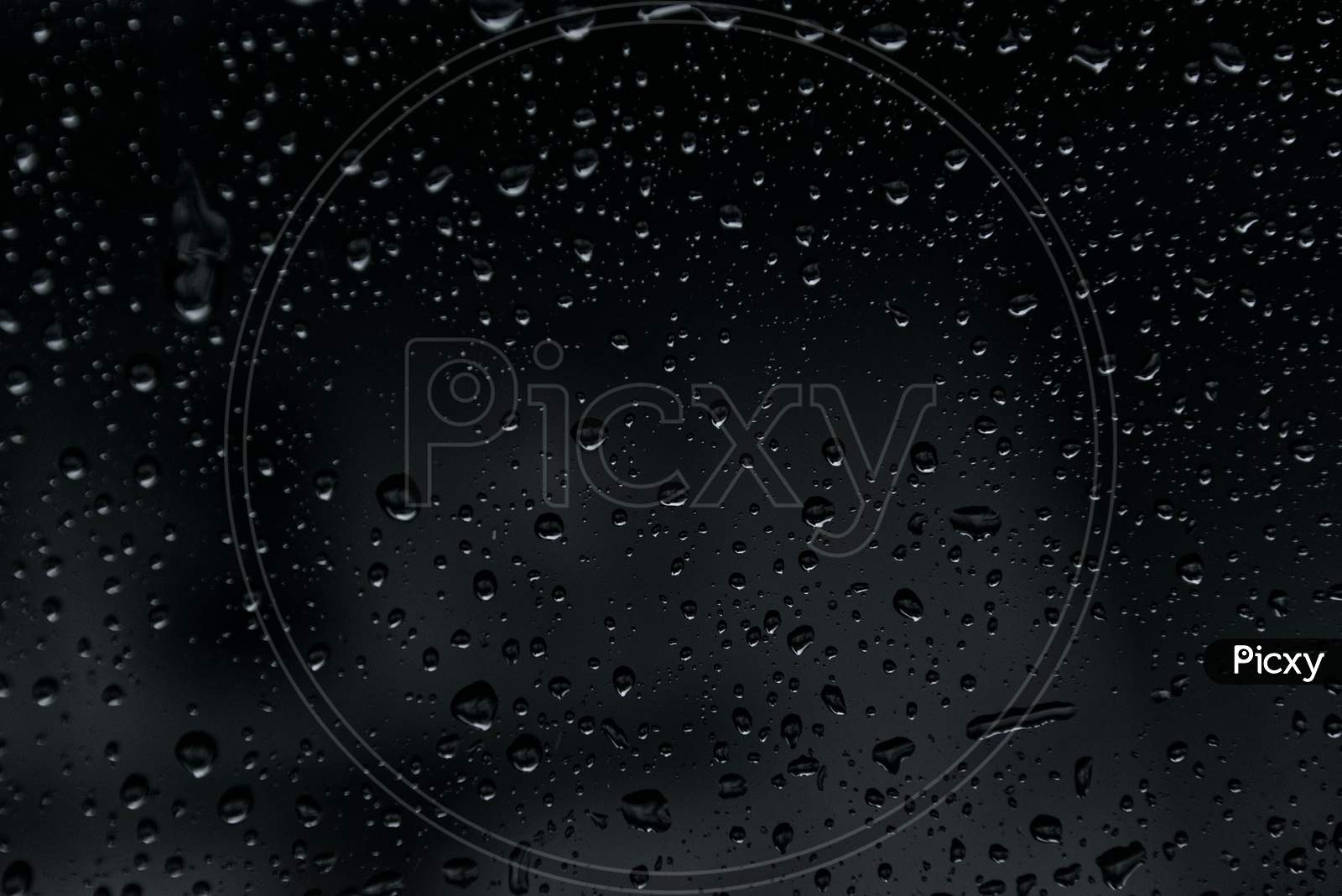 Black beckground Water drops with bubbles