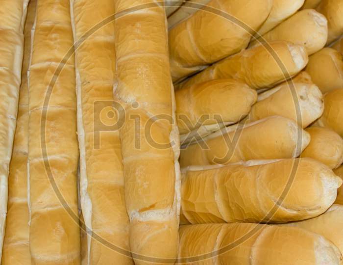 Background Of Baked Wheat Flour Breads In The Field