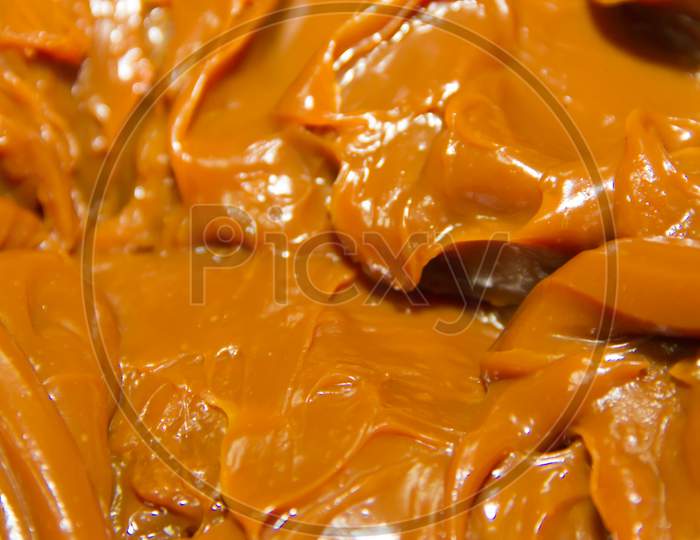 Textured Background Of Argentinean Dulce De Leche