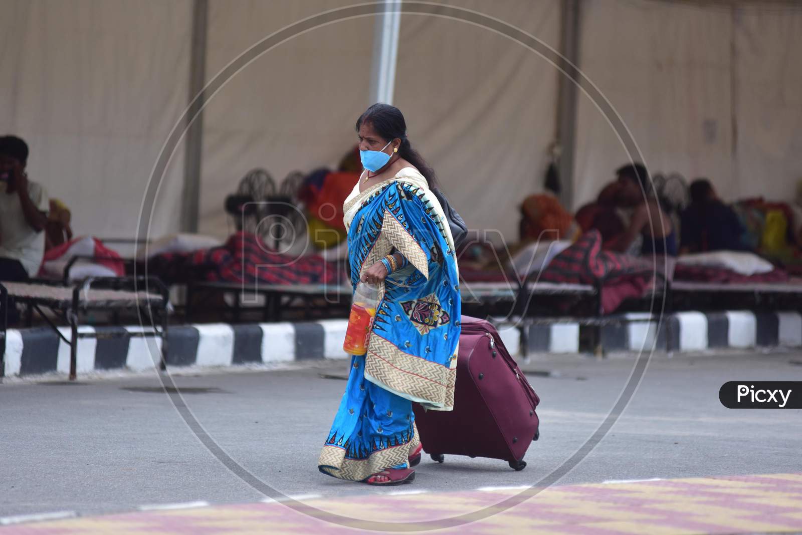 Passengers Along With Their Luggage Arrive At Guwahati Railway Station To Board A Train, After The Government Eased A Nationwide Lockdown In Guwahati ,India On June 14, 2020.