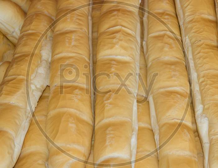Background Of Baked Wheat Flour Breads In The Field