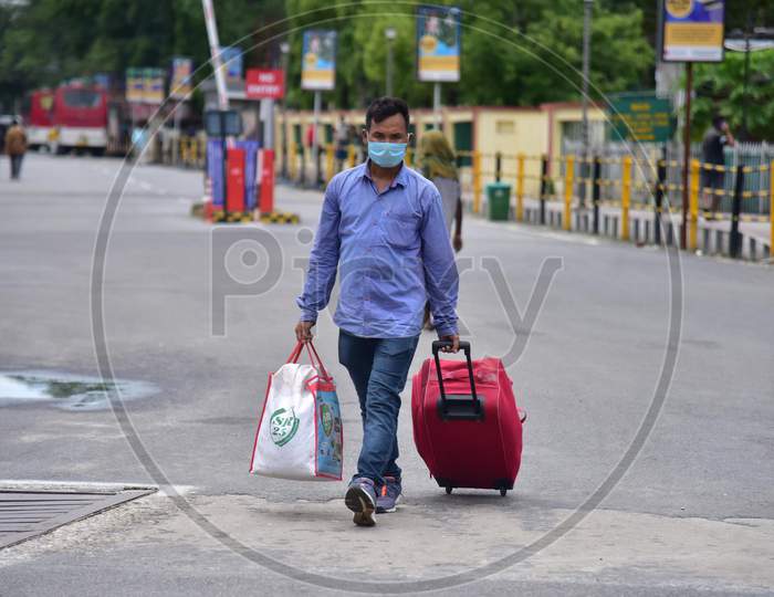 Passengers Along With Their Luggage Arrive At Guwahati Railway Station To Board A Train, After The Government Eased A Nationwide Lockdown In Guwahati ,India On June 14, 2020.