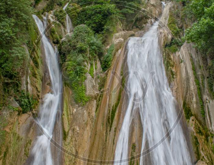 Kempty Falls is a waterfall in Ram Gaon and at the south of Kempty, in the Tehri Garhwal District of Uttarakhand, India.