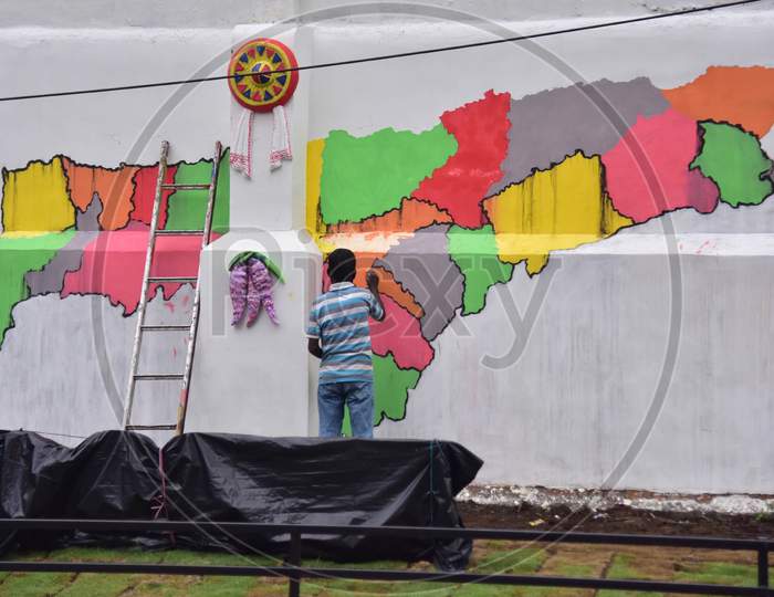 An Artist Paints A Mural - a Wall Map Of Assam In Guwahati , India  On June 14,2020.