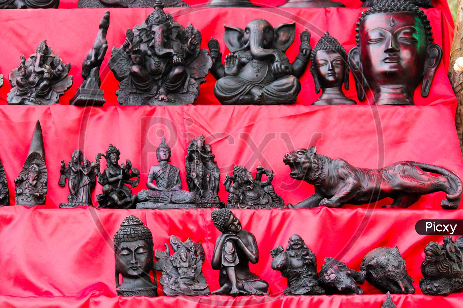 An antique shop showcasing Indian deities at Kerala tourism in India.