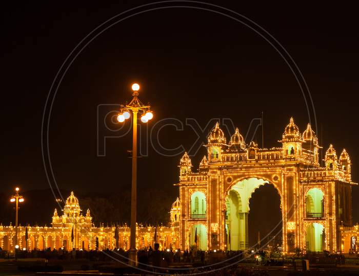An illuminated Mysore Ambavilas Palace entrance in Karnataka/India.