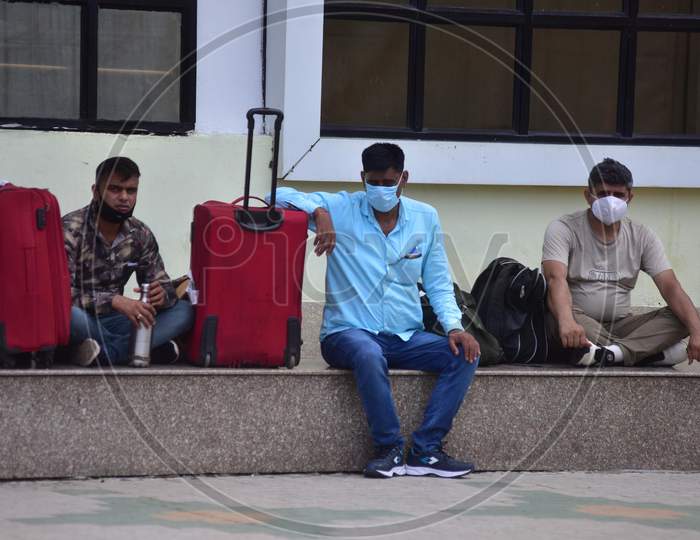 Migrant Workers And Families wait With Their Luggage At the Guwahati Railway Station To Board A Train, After The Government Eased A Nationwide Lockdown Against The Covid-19 Coronavirus, In Guwahati, India On June 14, 2020.