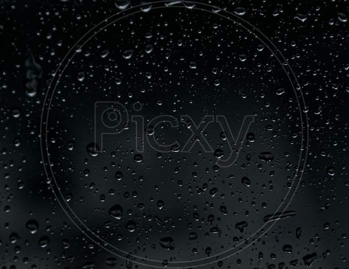 Black beckground Water drops with bubbles