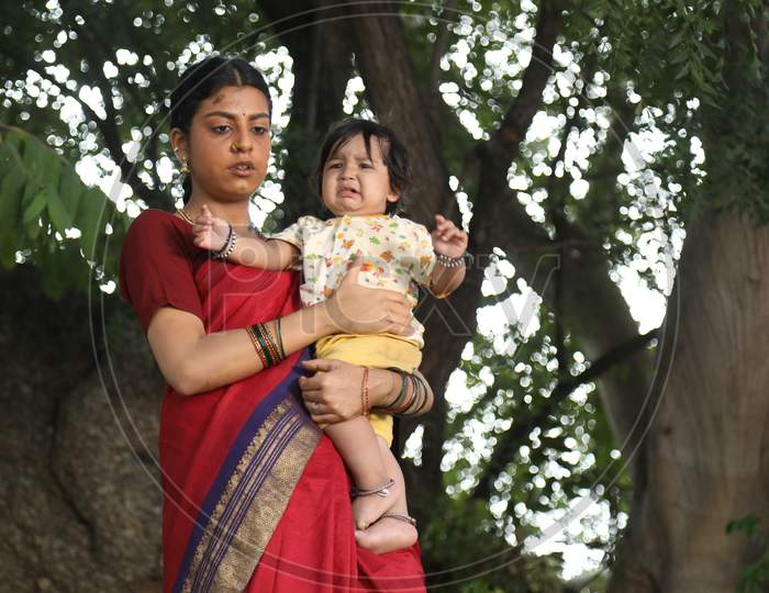 Mother and child in a village