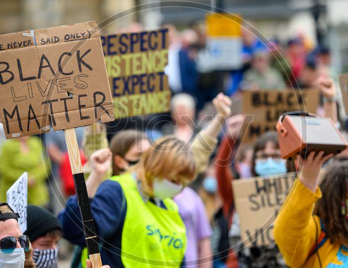 Homemade Black Lives Matter Signs Held High At A Blm Protest In Richmond, North Yorkshire