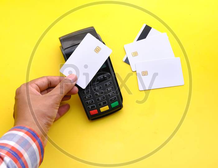 Payment Terminal Charging From A Card, Contactless Payment.