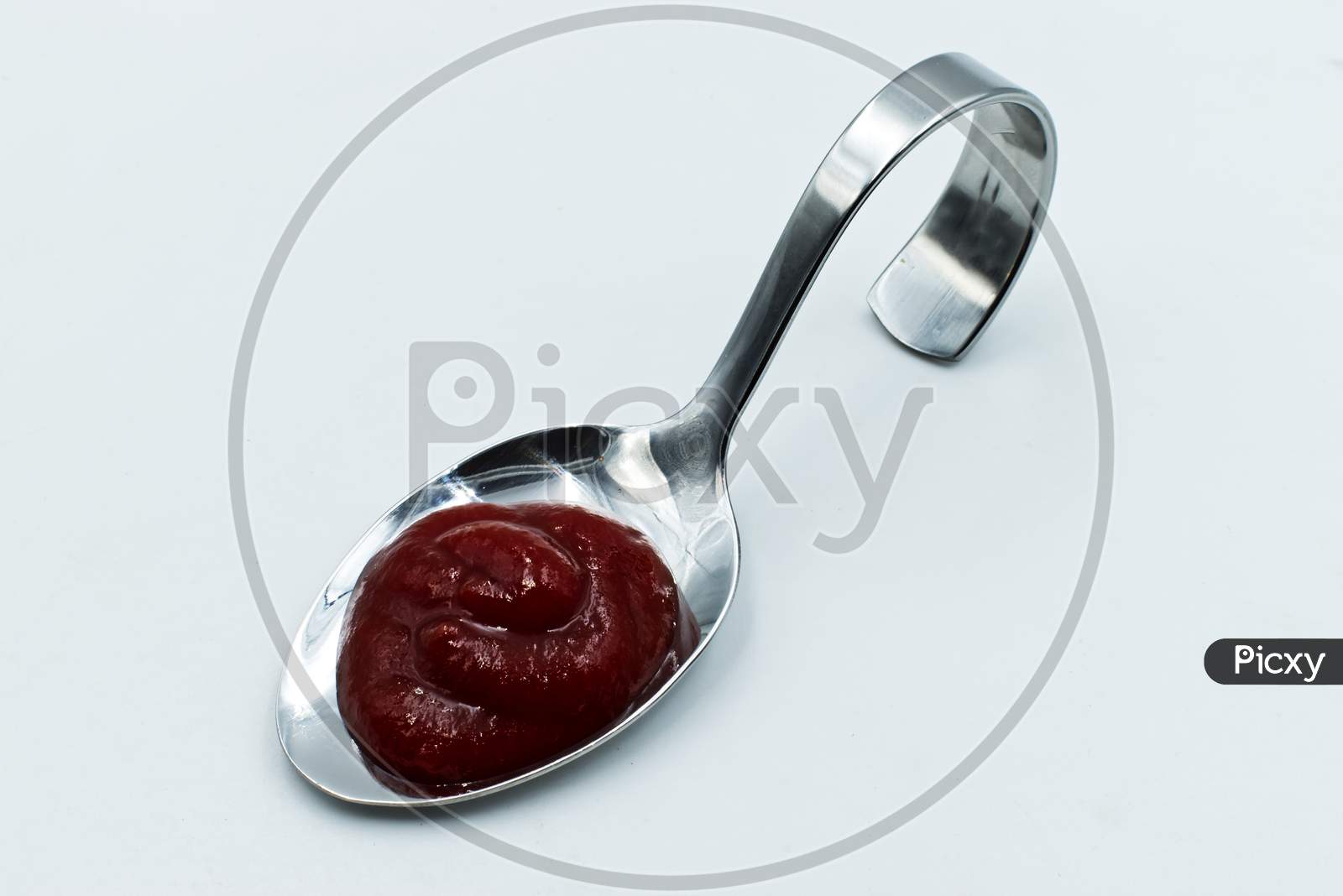 Fresh ketchup isolated on white background