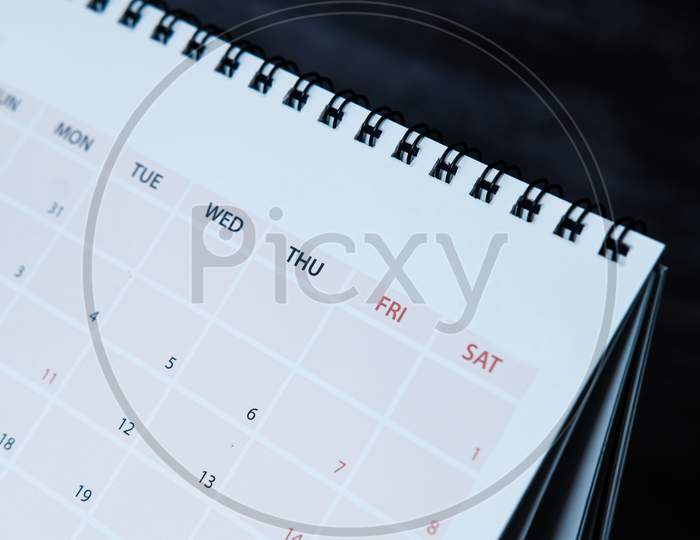 Detail View Of Calendar On Dark Background
