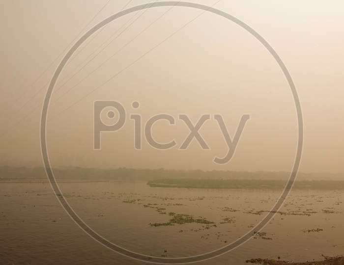 Polluted Smog Covered River Yamuna At New Delhi