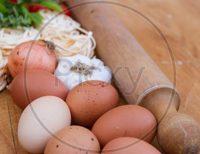 Eggs And Pasta With Cooking Ingredients And Spices