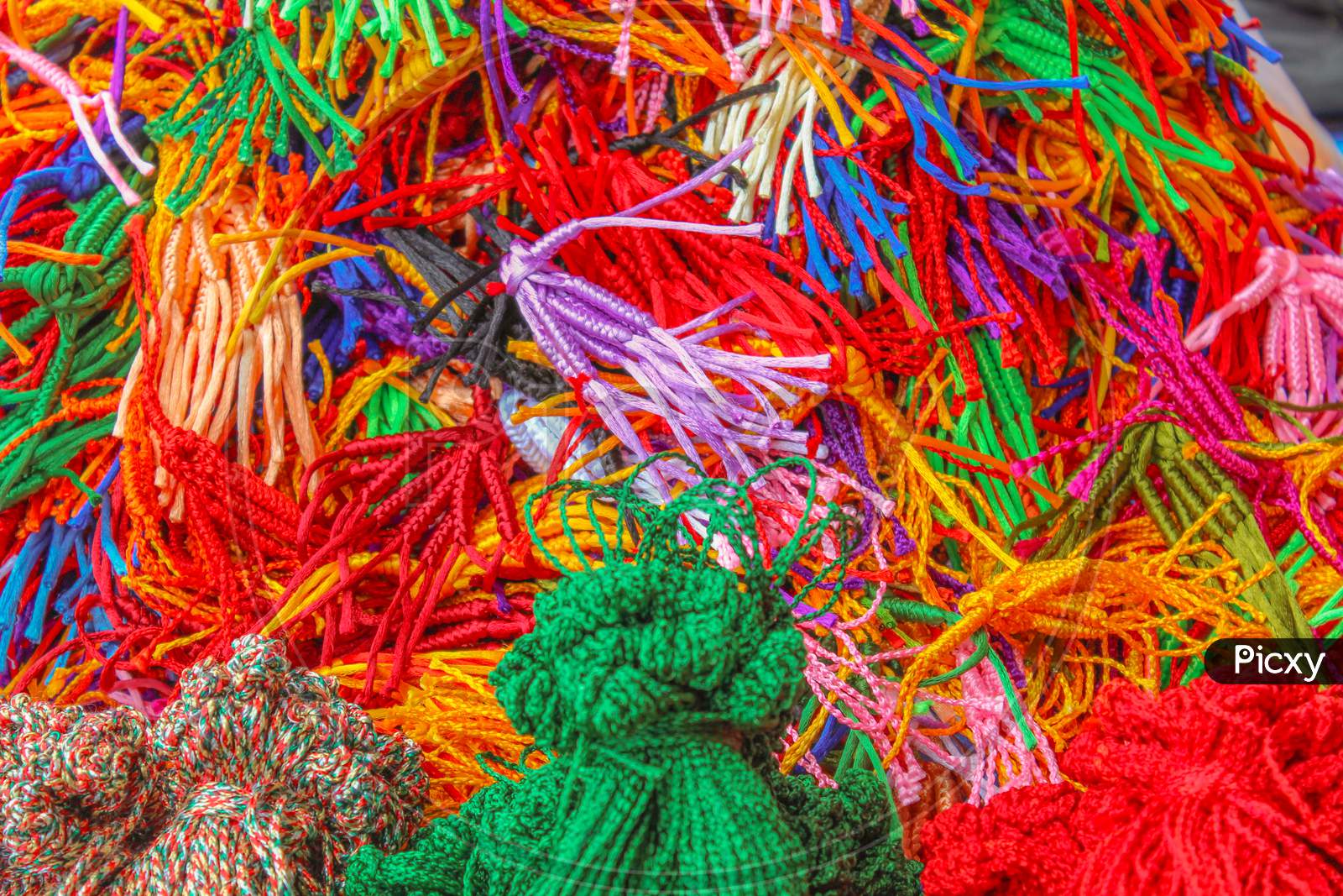 Colorful Holy threads at the Buddhist Monastery in Bylukoppa/India.