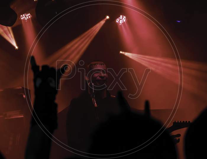 Krakow, Poland - September 20, 2014: An Artist Perform In A Hardcore Rock Band Music Concert Performance And The Crowd Enjoy