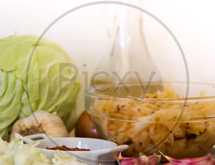 Handmade Preparation Of Sauerkraut And Cabbage Kimchi