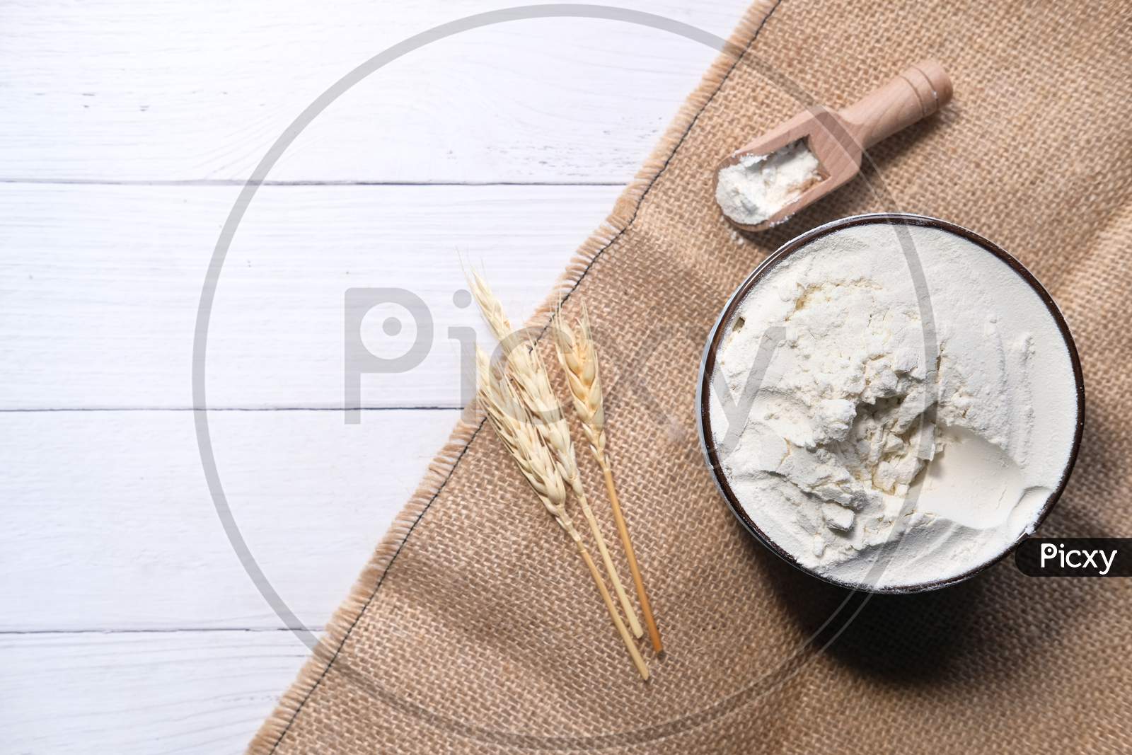 Production Of Wheat And Rye Flour On White Desk