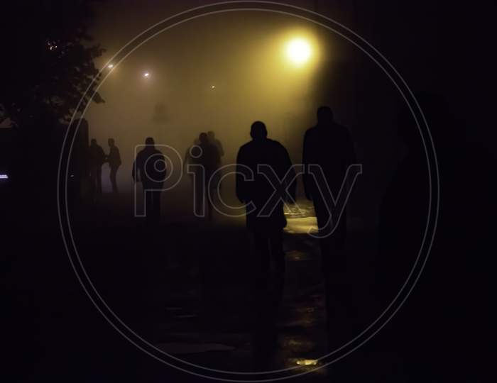 Krakow, Poland - September 20, 2014: People Leave After Concert In A Late Foggy Night