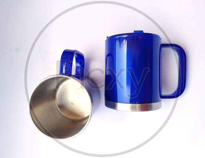 blue plastic coffee mug isolated on white background