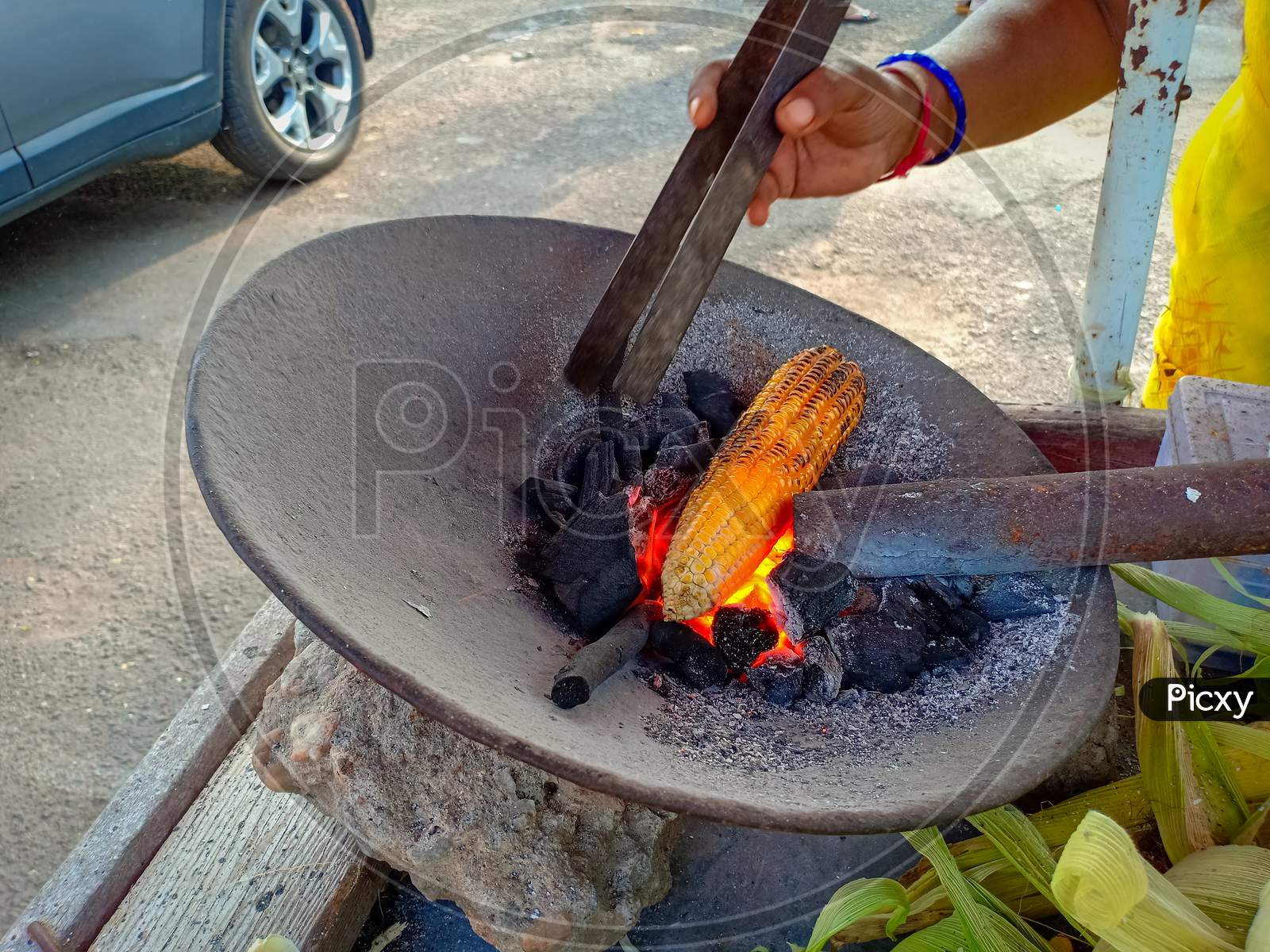Sweet corn roasted in Charcoal fire