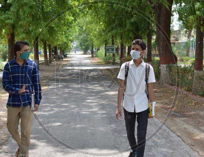 indian college student in campus with mask