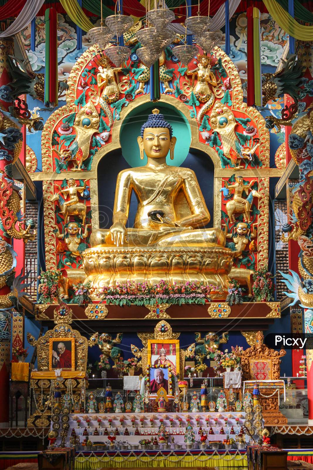 The Golden Buddha Statue at Bylukoppa town in Coorg district of Karnataka/India.